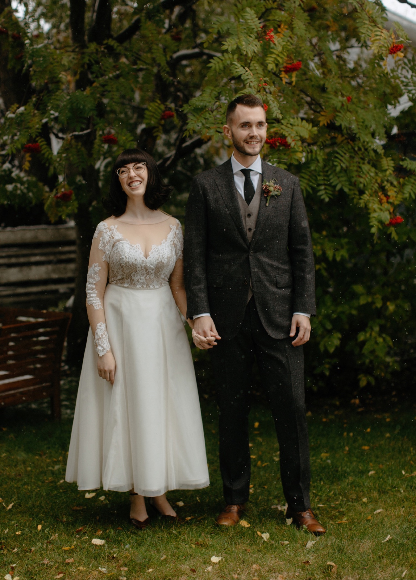 Retro 1950s bridal fashion with a custom skirt and patterned suit for a snowy Edmonton wedding
