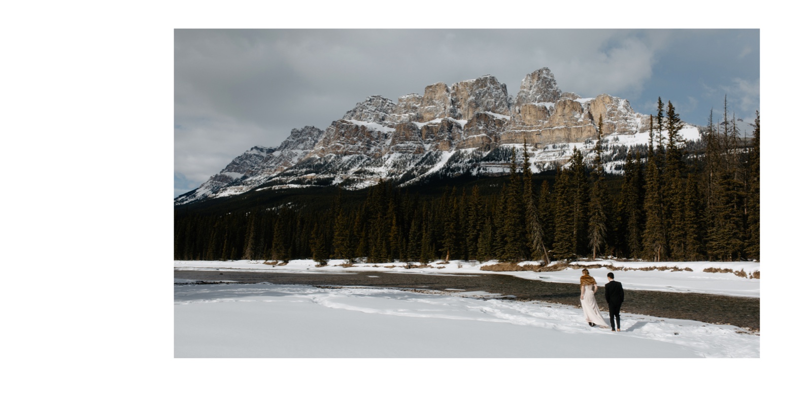 Wedding portraits along the Bow River at Castle Mountain Junction between Banff and Lake Louise
