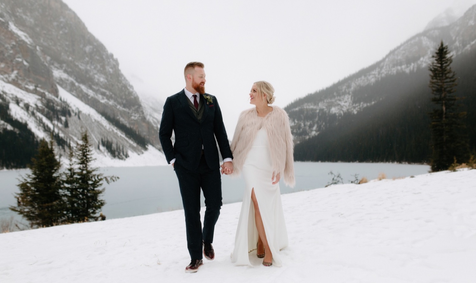 Imtless portraits with a Sarah Seven dress and a soft pink faux-fur shawl at Chateau Lake Louise
