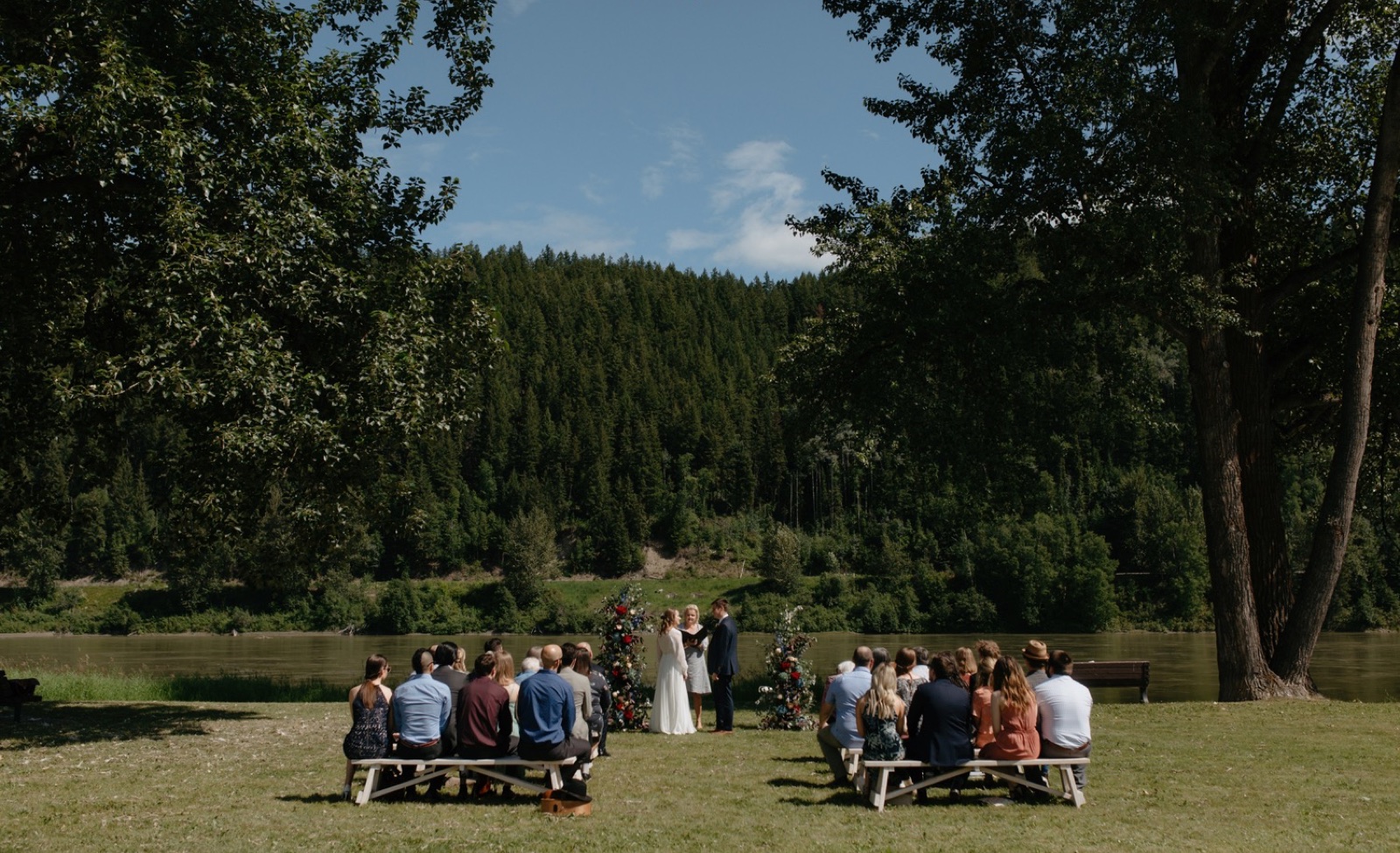 An intimate wedding ceremony overlooking the Fraser River in Paddlewheel Park, British Columbia