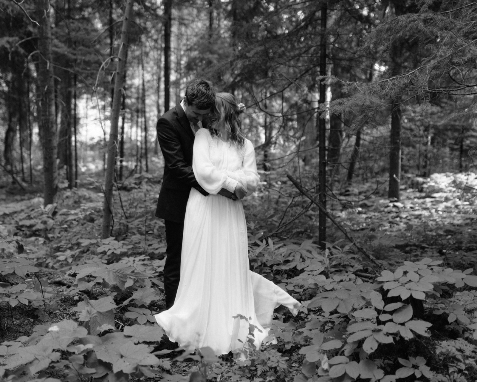 Classic black and white portraiture in a fern-laden forest in northern British Columbia