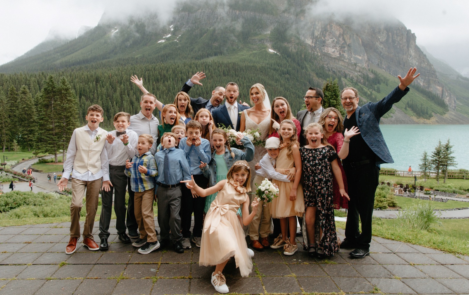 Fun wedding family photos on the Victoria Terrace at Chateau Lake Louise