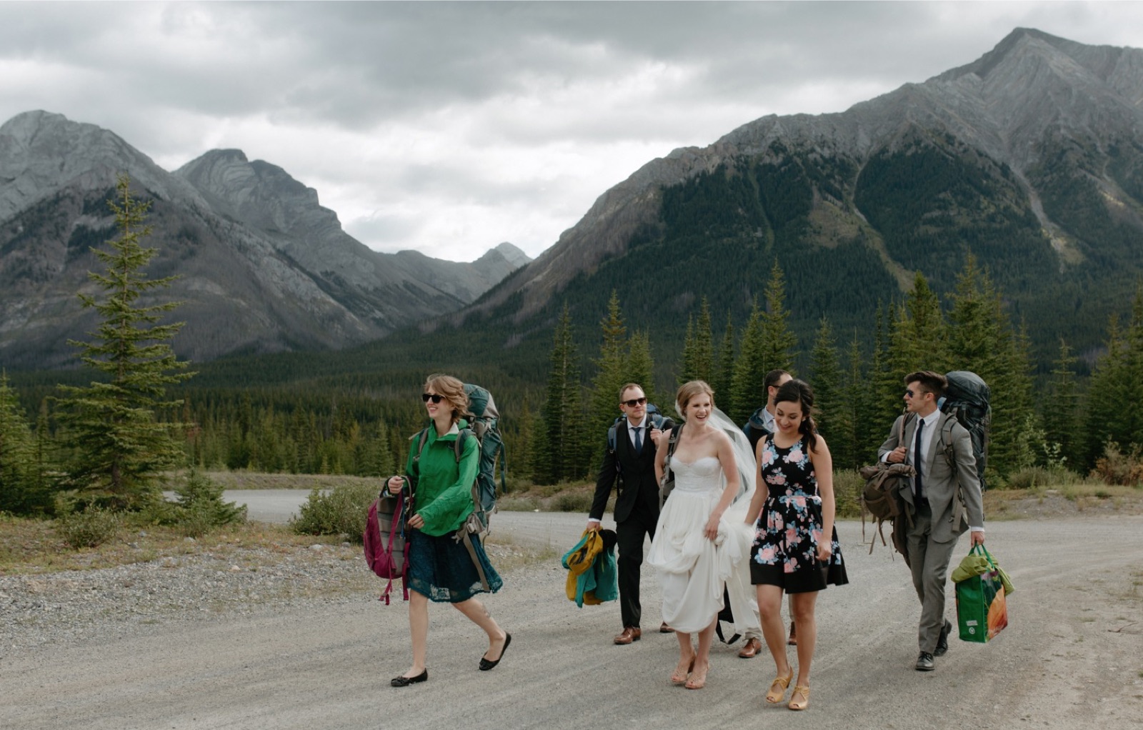 Small wedding party hiking to Mt Shark Helipad in Spray Valley Provincial Park