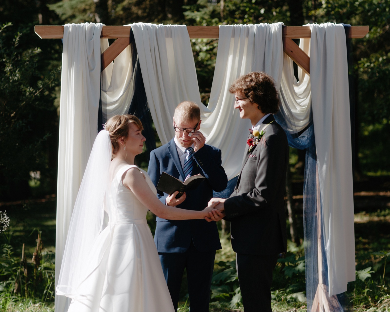 Father of the bride officiating her wedding in Kananaskis Country