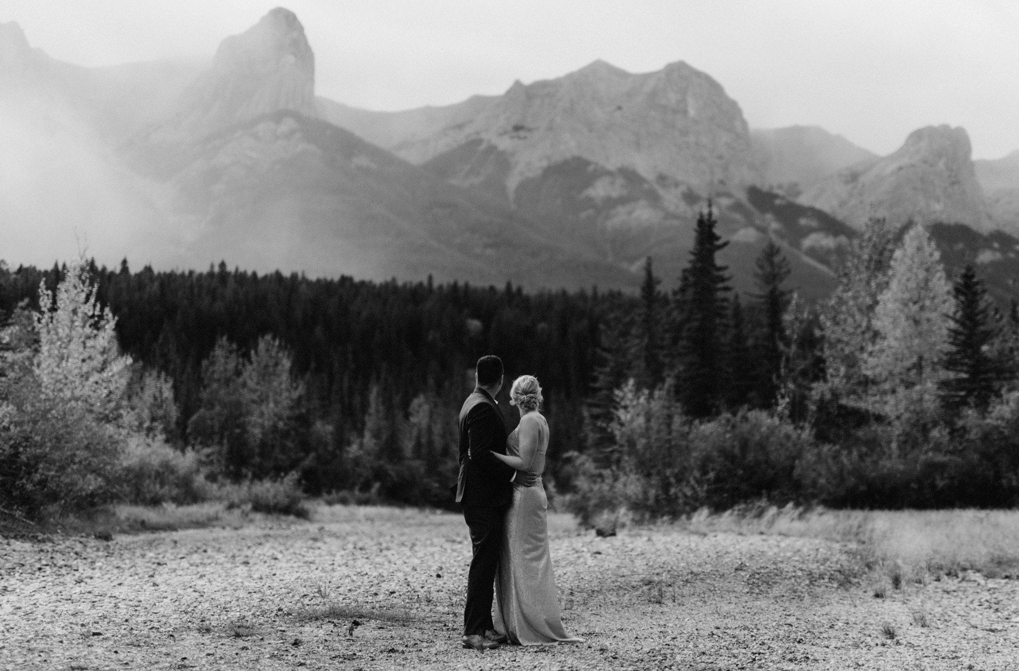 Mount Rundle and empty riverbed wedding portrait location in Canmore