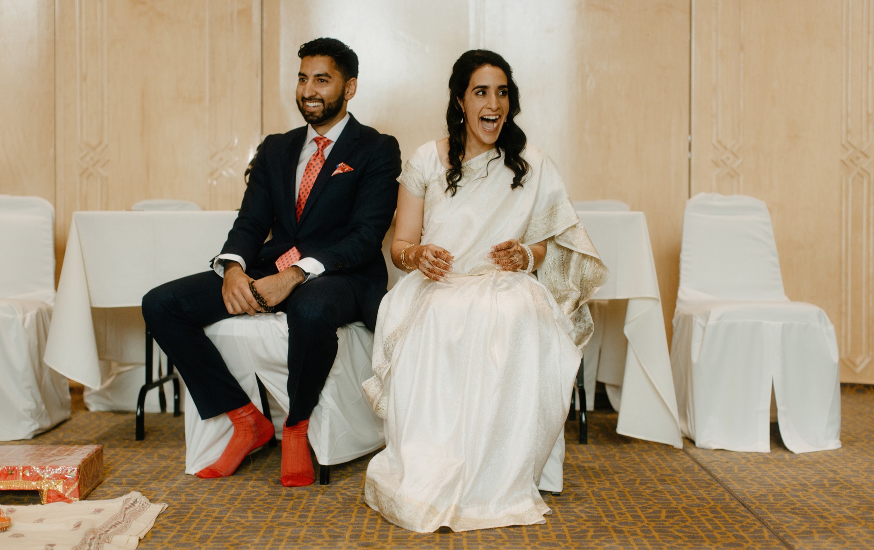 Calgary Ismaili Jamatkhana wedding with couple laughing
