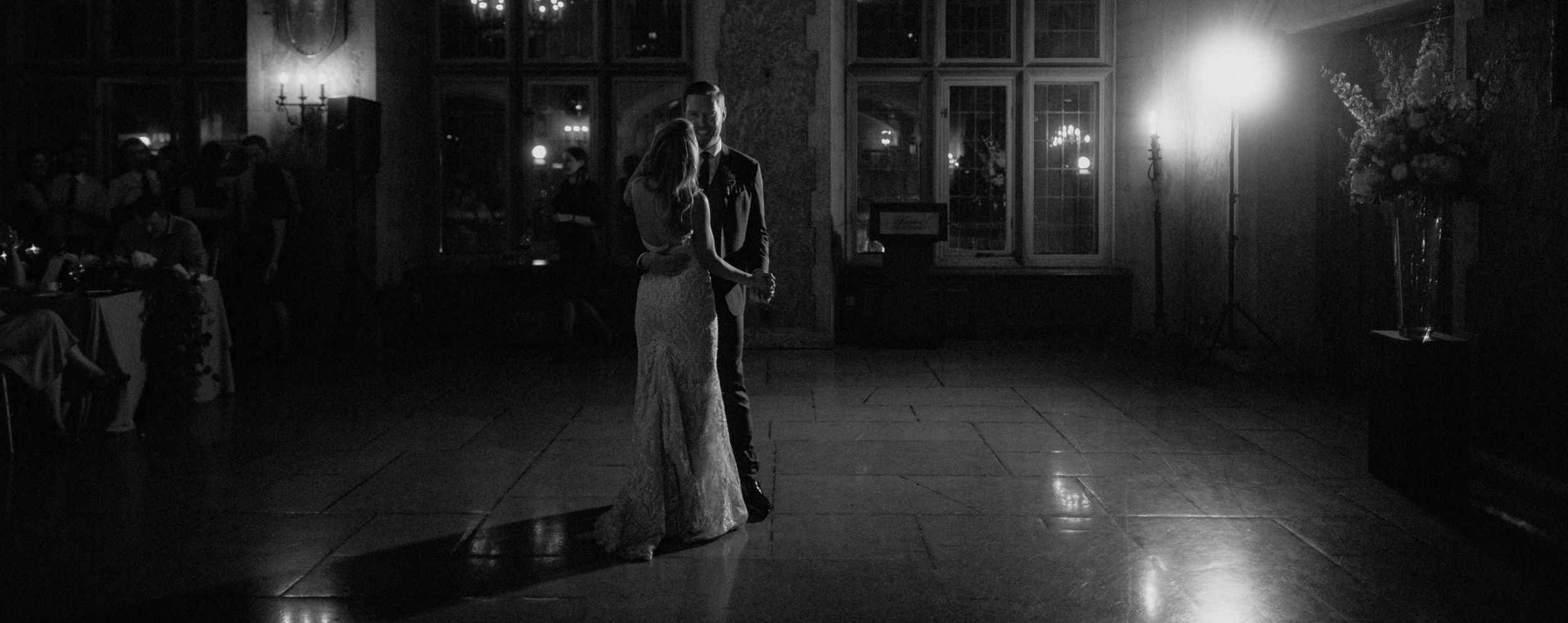 Moodily lit first dance in Mt Stephen Hall in Banff for a classic wedding