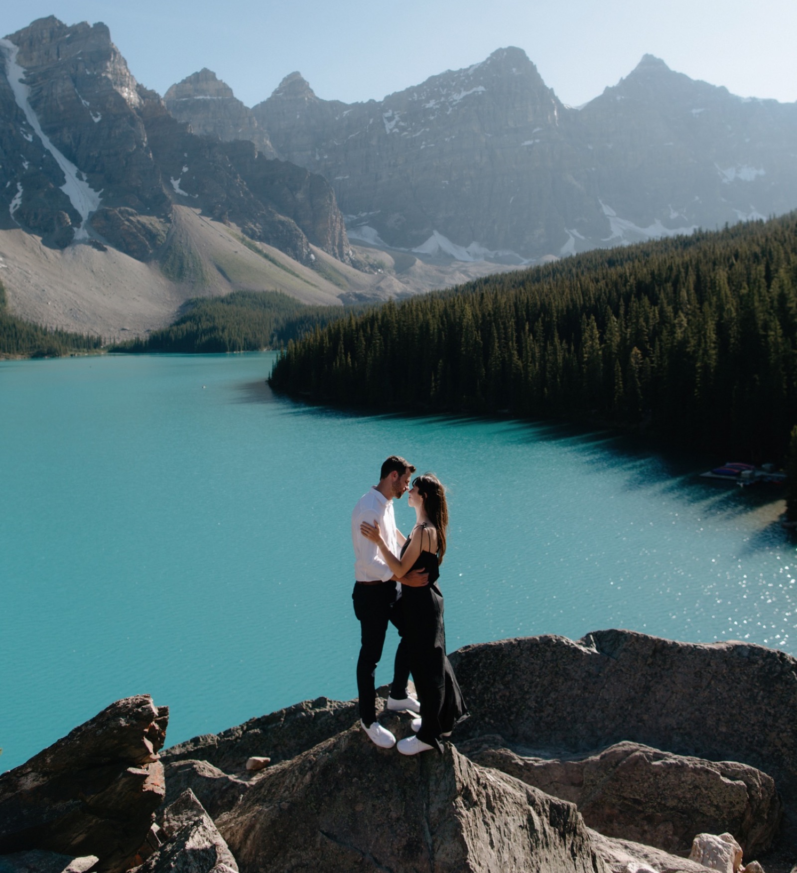 Alternative elopement with the bride wearing a black jumpsuit at Moraine Lake