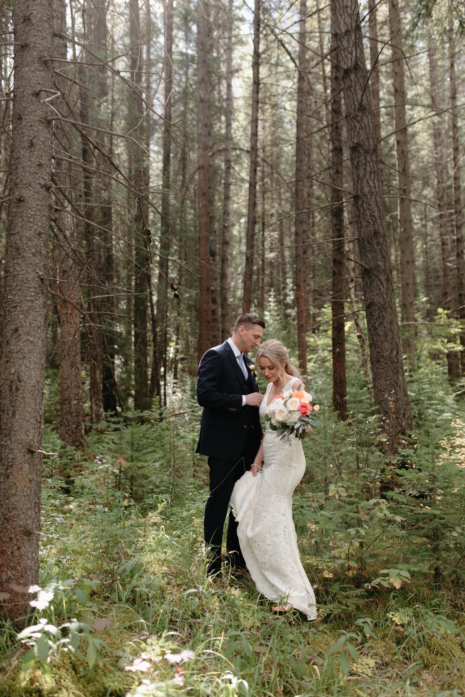 First look in the forest by Cathedral Mountain Lodge for an elopement