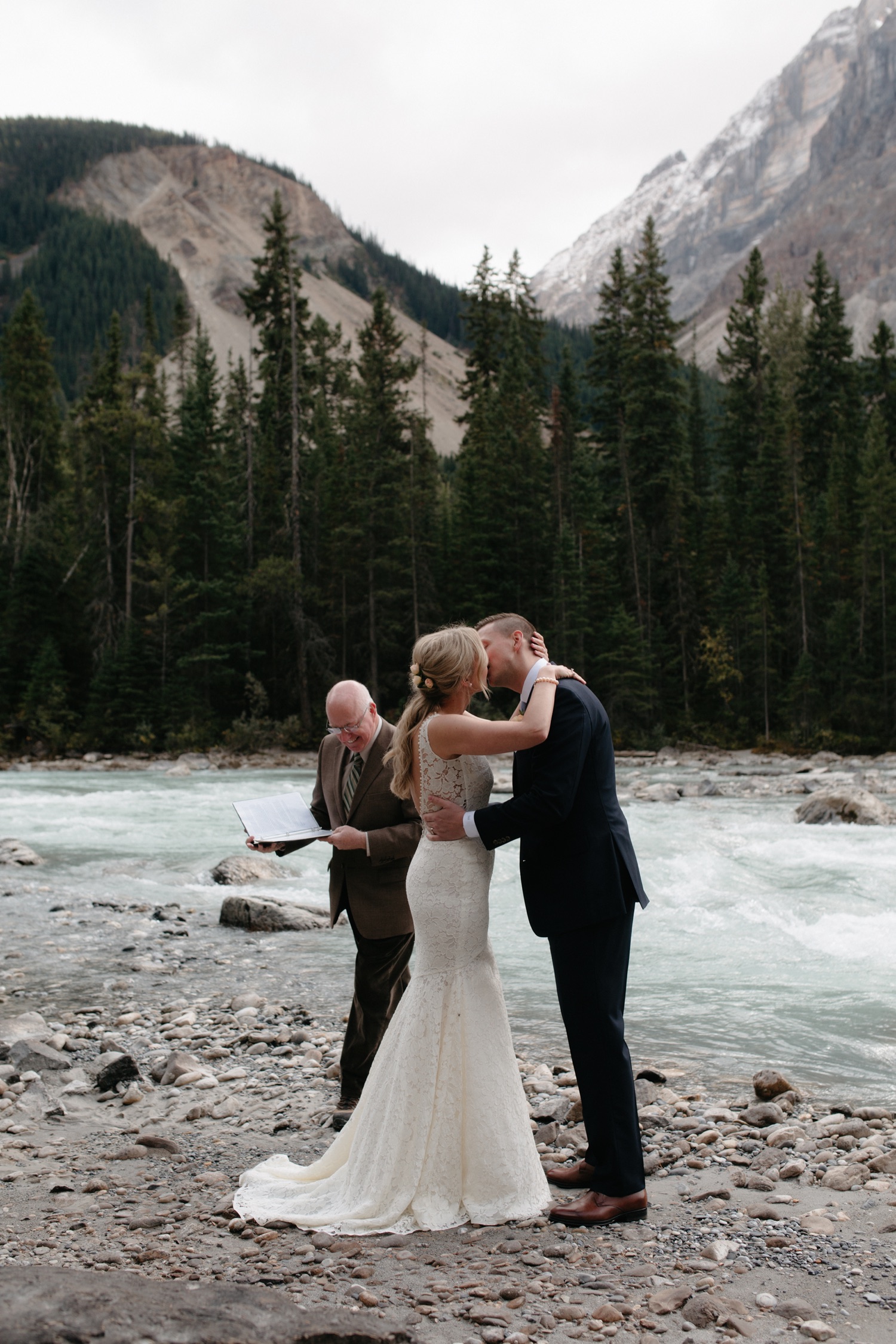 Cathedral Mountain Lodge elopement ceremony spot along the river