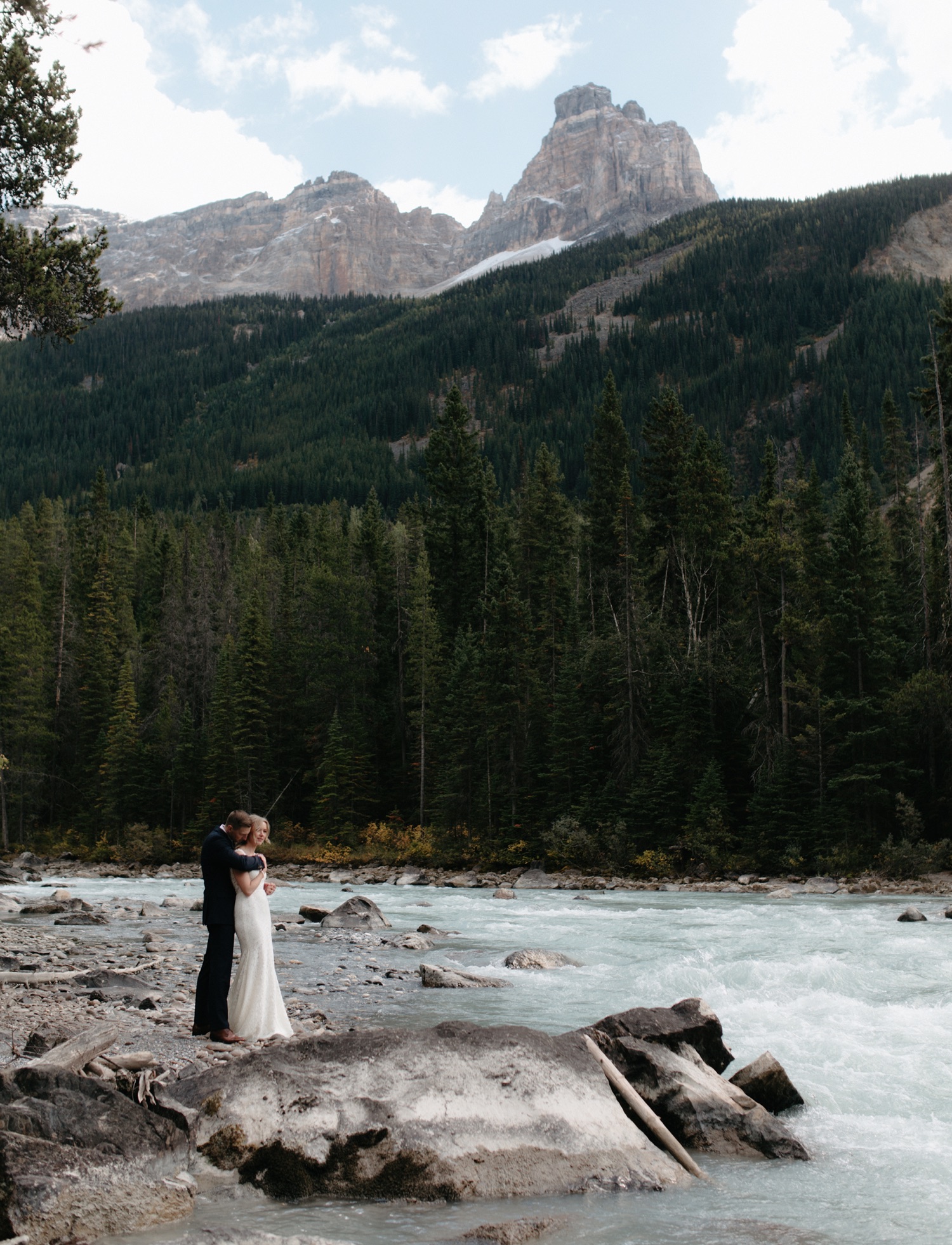 Cathedral Mountain Lodge elopement inspiration along a galcial fed river in Yoho National Park