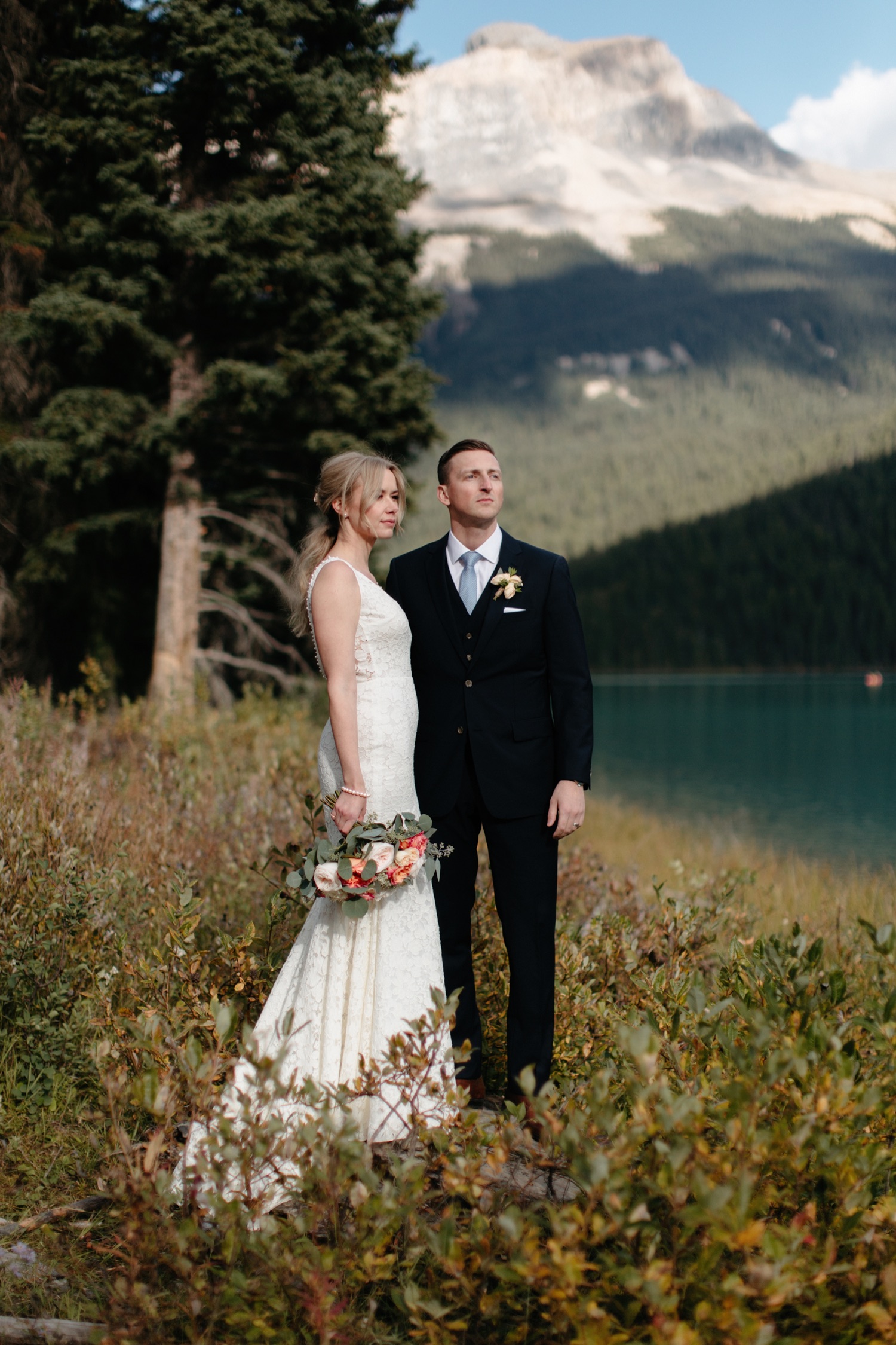 Emerald Lake Lodge elopment in fall with coral bouquet