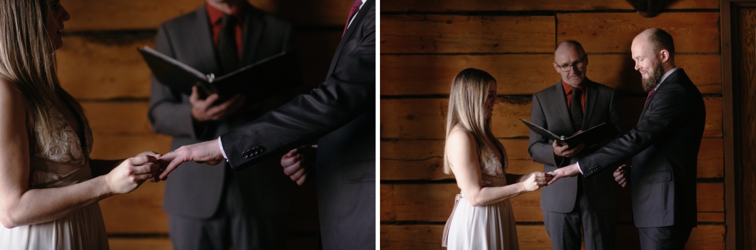 Couple exchanging rings at an intimate wedding ceremony in a cabin in the Canadian Rockies