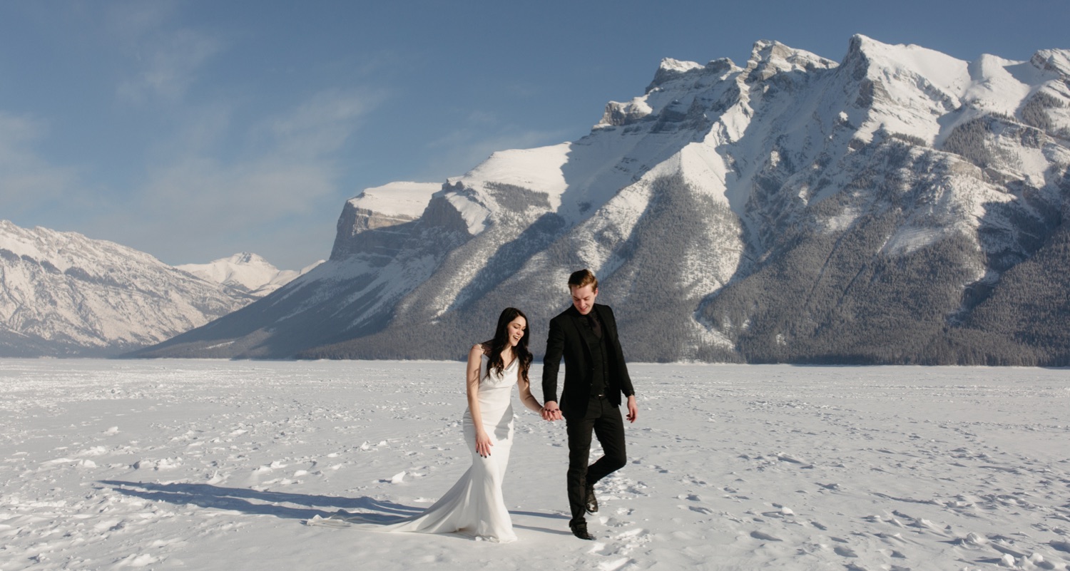 Classic wedding portraiture at Lake Minnewanka in Banff
