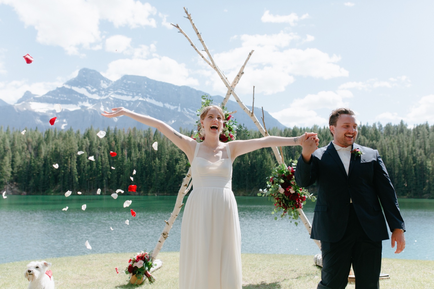 Rose petal ceremony exit at a Johnson Lake wedding