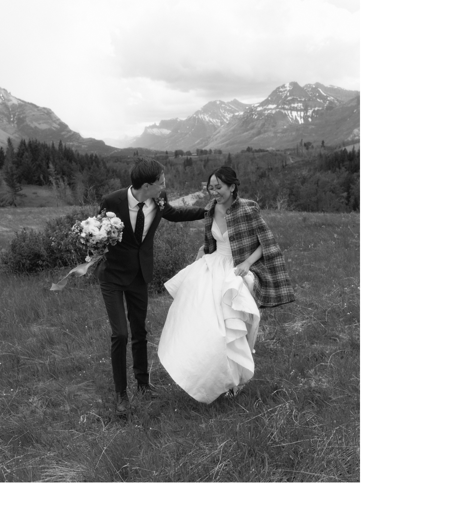 Couple escaping the wind after their unique wedding ceremony in Waterton National Park