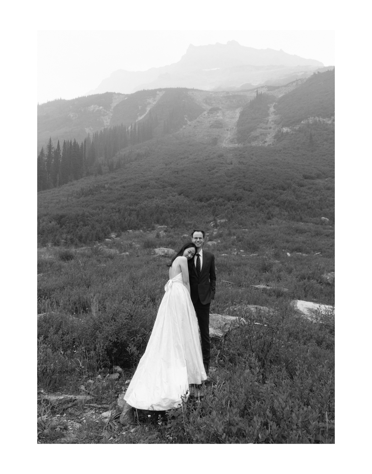 Timeless editorial wedding portraiture in an avalanche path in Banff National Park