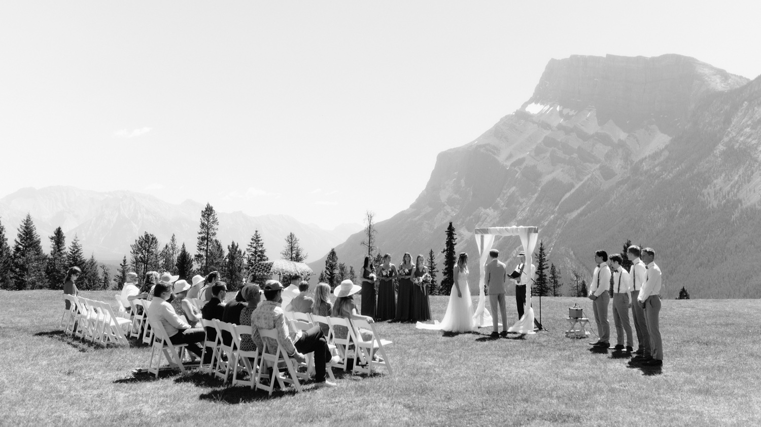 Intimate summer Tunnel Mountain Reservoir wedding ceremony in Banff