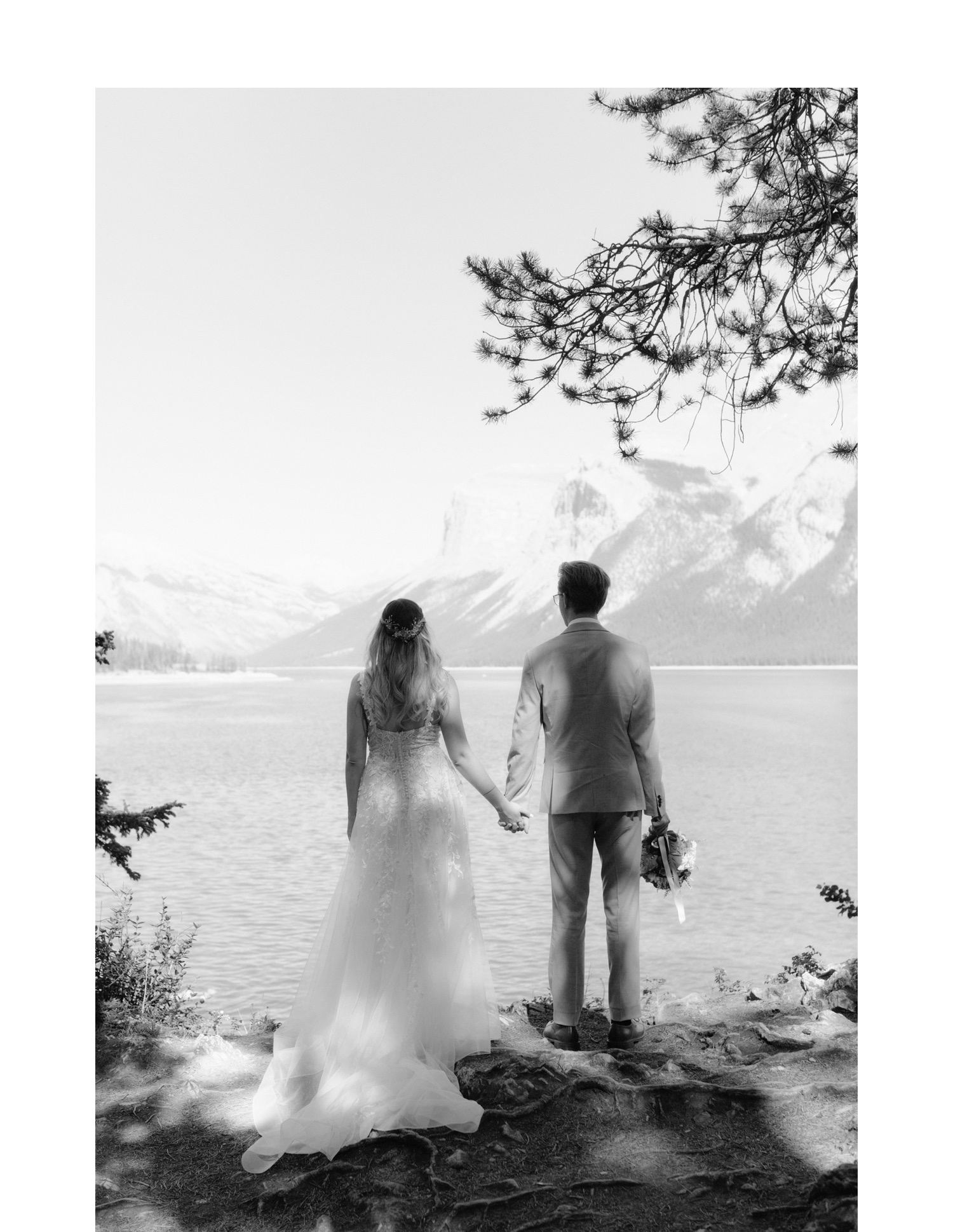Midday summer wedding portraits at Lake Minnewanka in Banff National Park